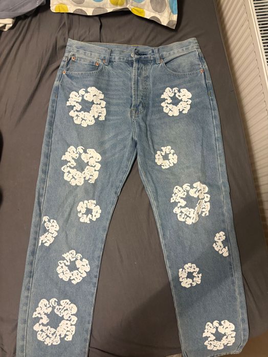 дънки на denim tears