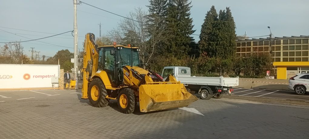 Buldoexcavator caterpillar