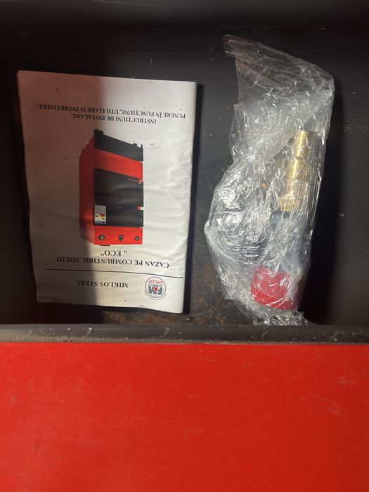 Centrala pe combustibil solid lemne , carbune  27 kw + 6 calorifere