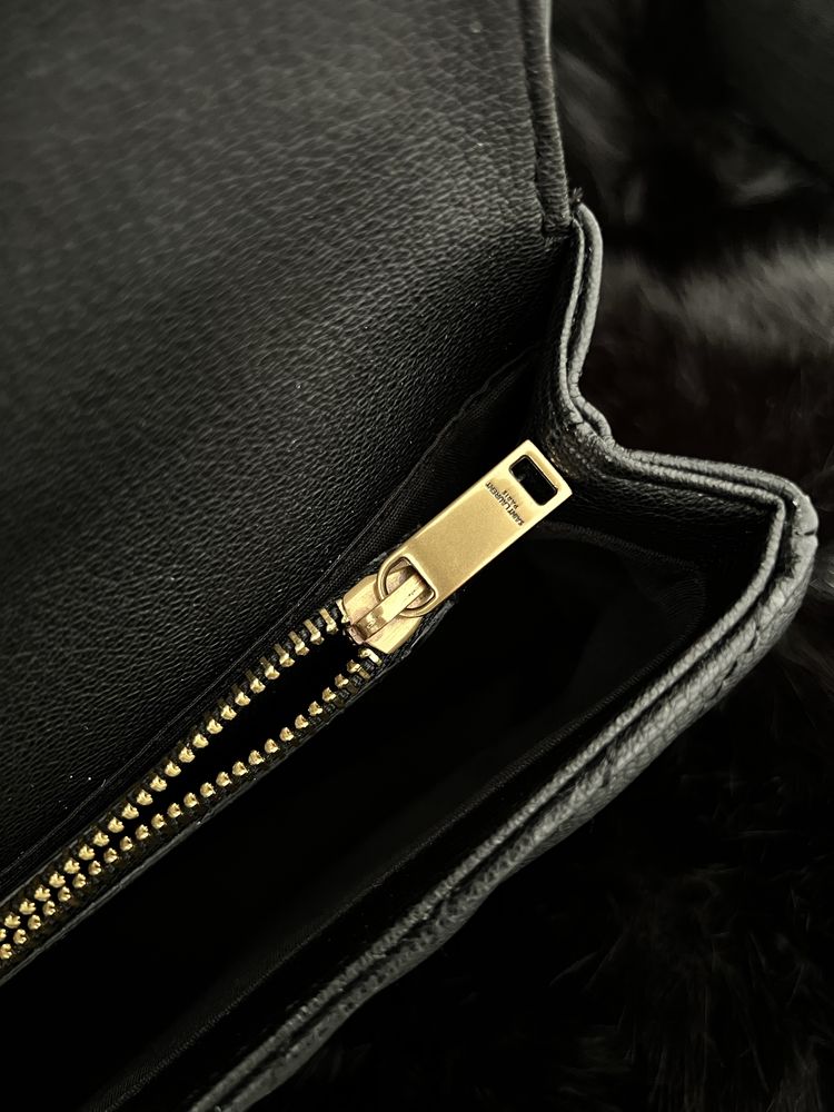Чанти и портмоне на марката ysl