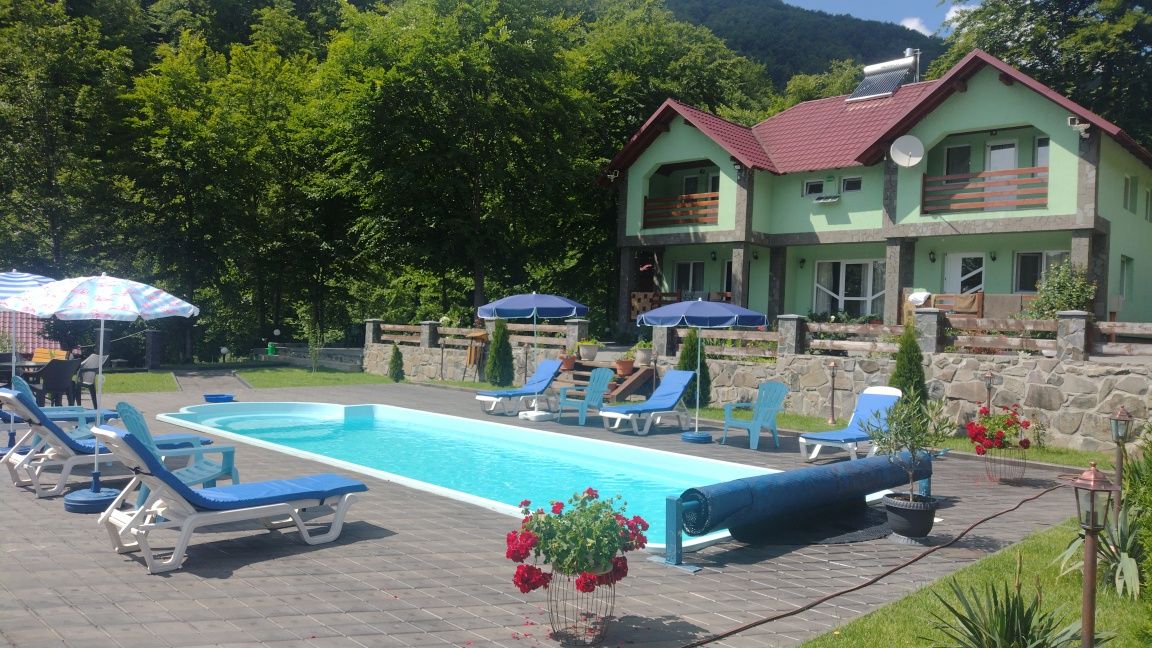 Cabana cu piscina pensiune casa de vacanta cu ciubăr Maramureș