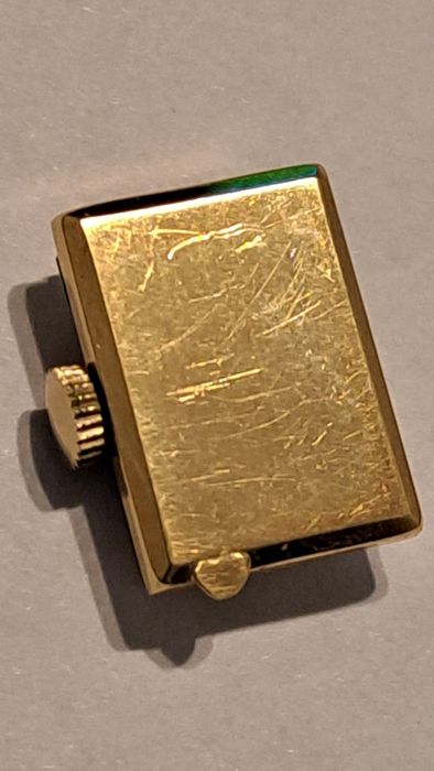 Mecanism plus capac de Aur 18 K Movado