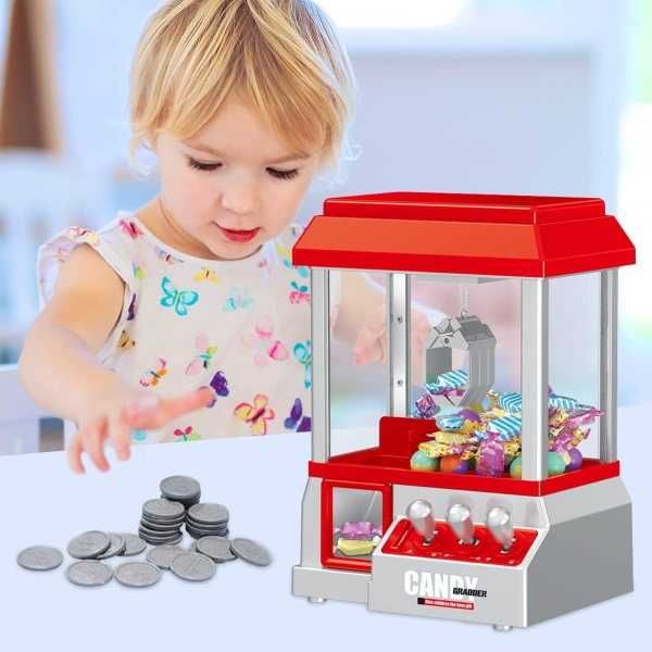 Aparat interactiv de prins bomboane si jucarii