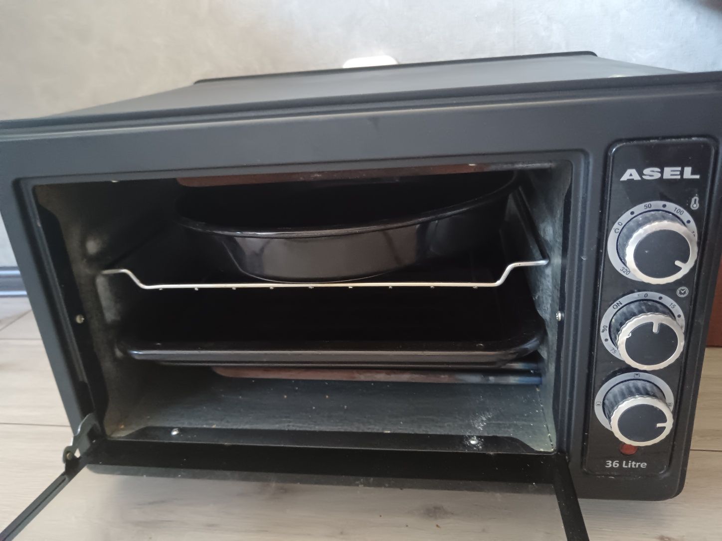 Продам электрическую духовку Asel