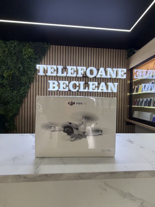 Drona sigilata dji mini 4K ( contine gentuta+ baterie+ drona+ maneta )