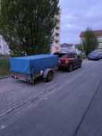 Remorca 1200 kg frânata cu prelată.