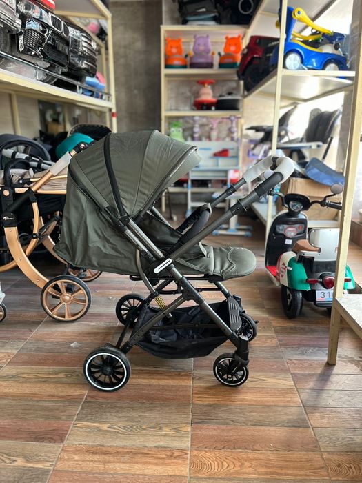 Коляска перекедной ручкой