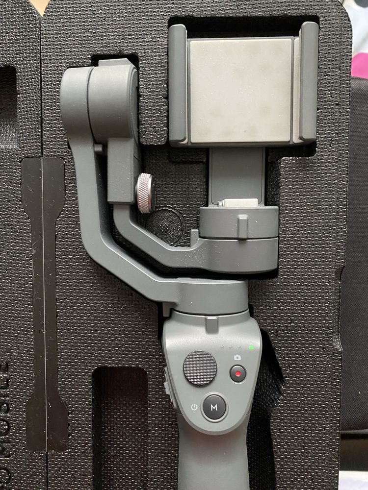 Dji osmo mobile 2 (nu mai tine acumulatorul)