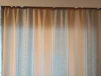 Draperii cu un ton cald din material foarte bun cu lungimea 2 pe 210