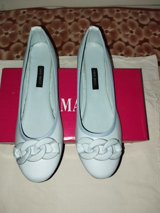 Балетки голубые.