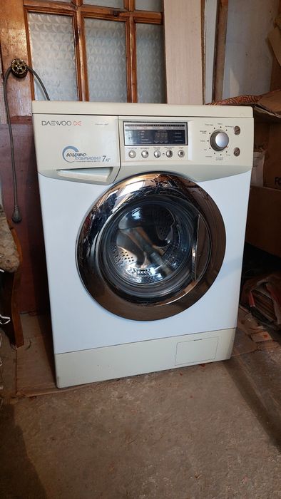 Кір машина жұмыс жасап тұрған 7 кг