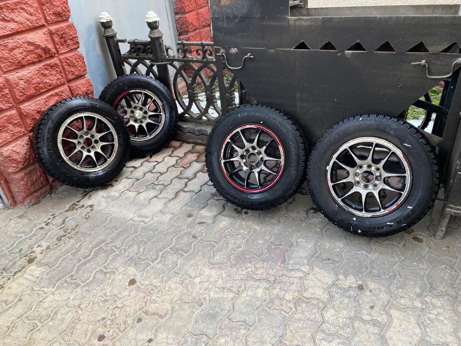 Продам автошины шипованные 4шт. б/у 185/70R14 с дисками