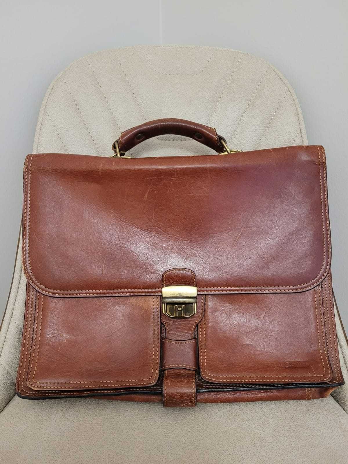 Продам кожаный портфель.