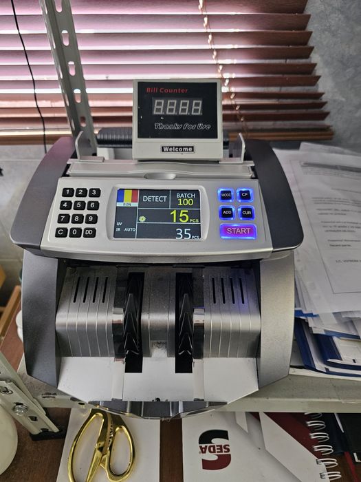 Masina numarat bacnote