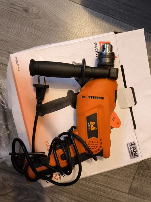 Bormasina cu percuție