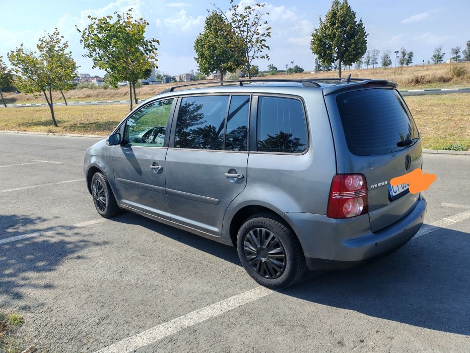 Volkswagen Touran 1.6 benzina și gpl 1199 e .