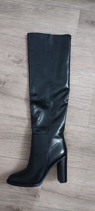 Продам сапоги новые