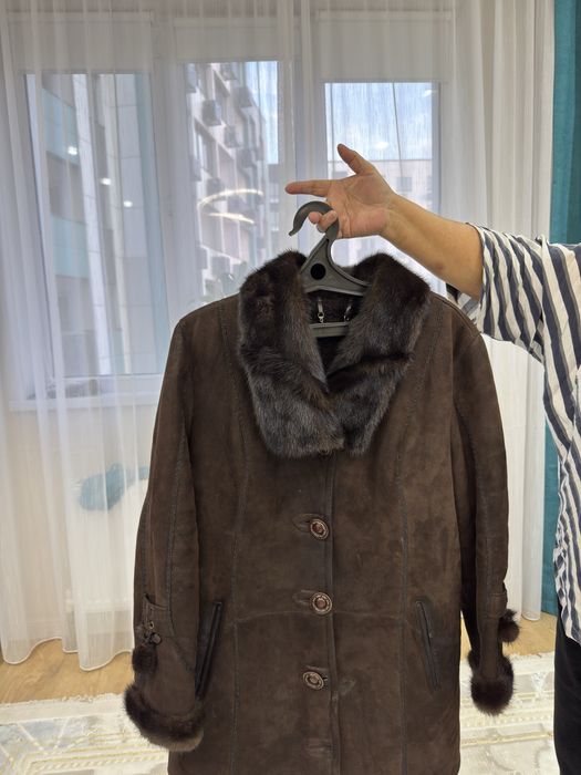 Дубленка женская в опрятном состоянии