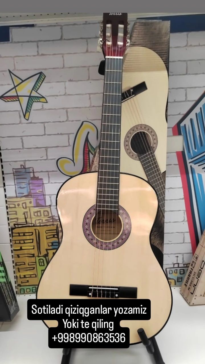 Arzon narxlarda gitara sotiladi holati zoʻr.