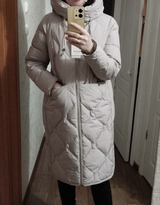 Продам пуховик новый