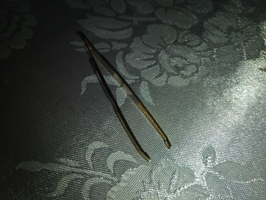 Penseta Monicare Solingen cu varf tesit , placat cu aur .