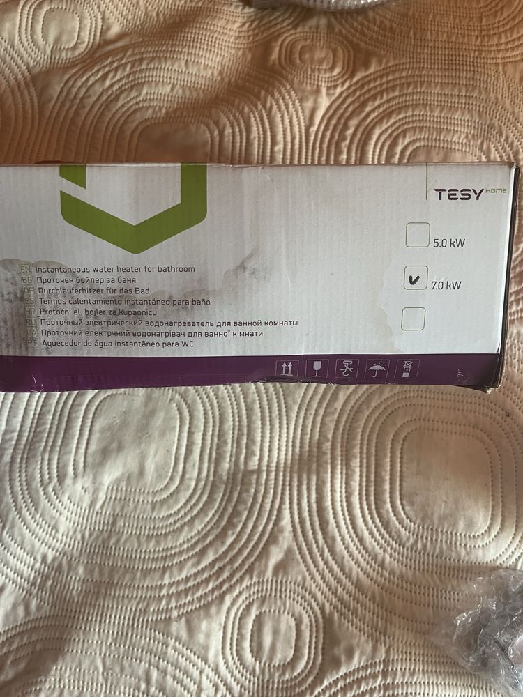 Продавам проточен бойлер Tessy 7KW