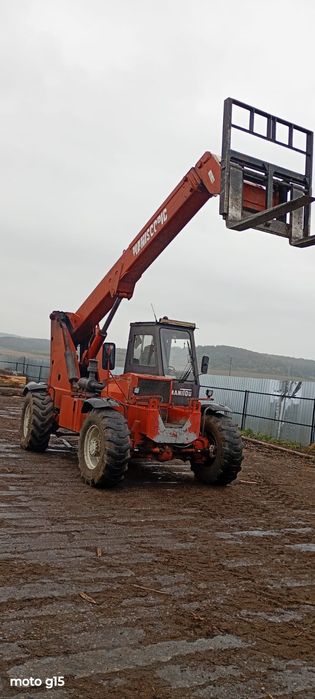 Manitou brat de 6 m are cupa și lame an de fabricație 1993 ridica 5 t