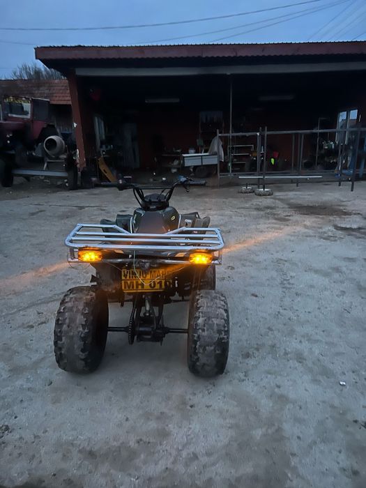 Vând  atv 125  c