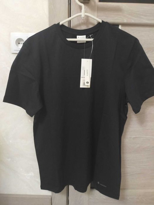 Новая мужская футболка 52 размер.