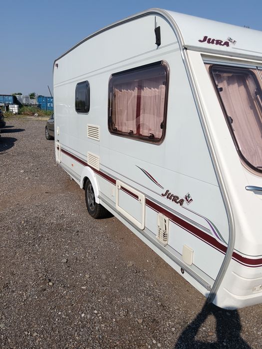 Vind rulota marca Jura, înmatriculată,an 2003.