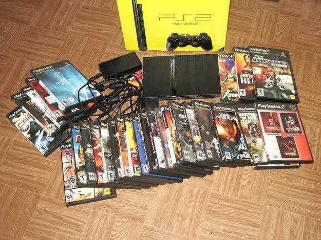 продам классную игровую приставку  плейстейшин 2 с дисками