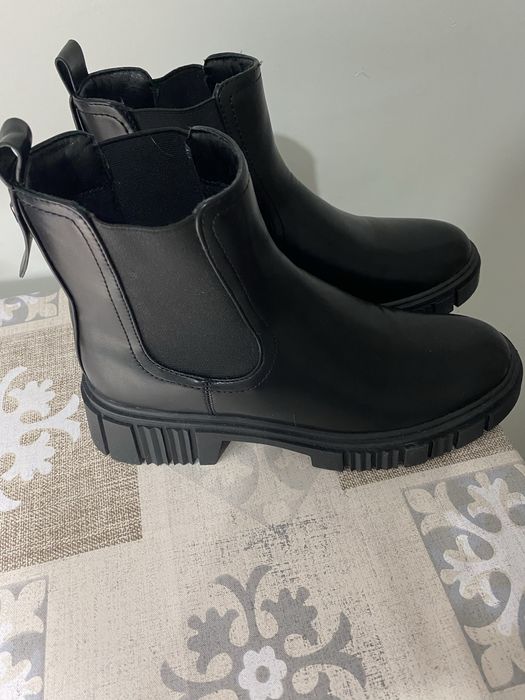 Продам сапоги новые