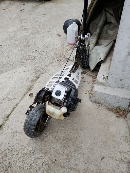 Vând trotineta Uber Scott 70x 71cc