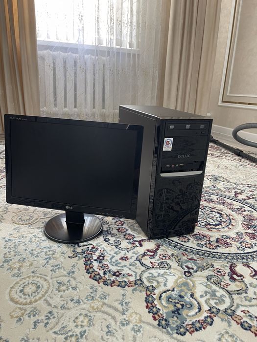 Продается процессор и монитор  процессор Delux монитор lg