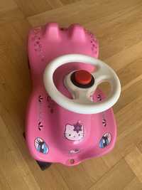 Детска кола за бутане в розов цвят от серията на "Ride-on Hello Kitty"