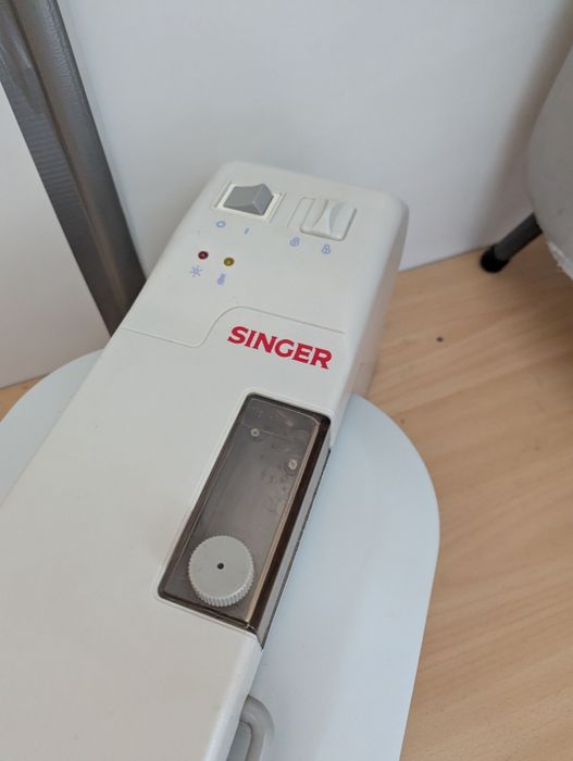 Presa de calcat Singer