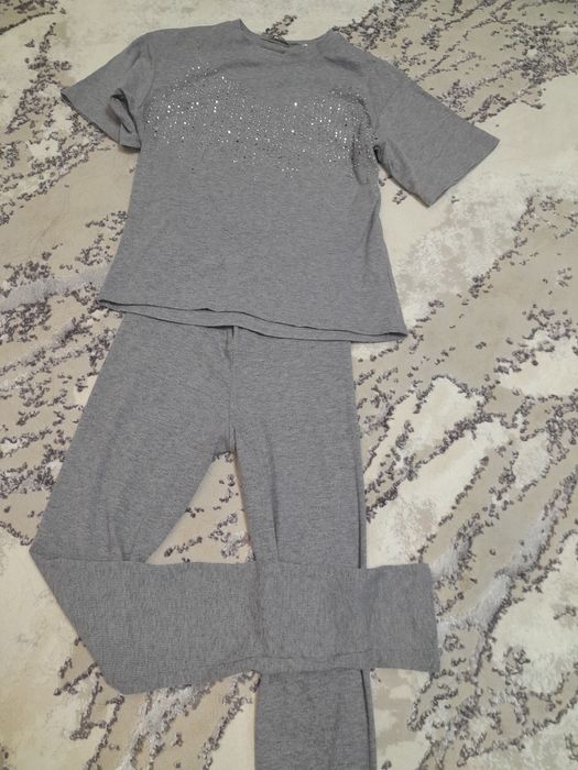 Костюм на девочку 8-10 лет.новое