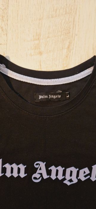 Tricou negru Palm Angels marimea L, merge la un M.