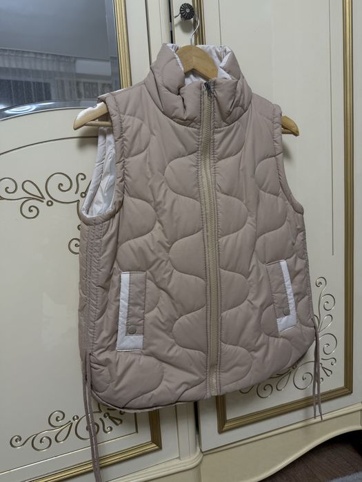 Безрукавка жилетка