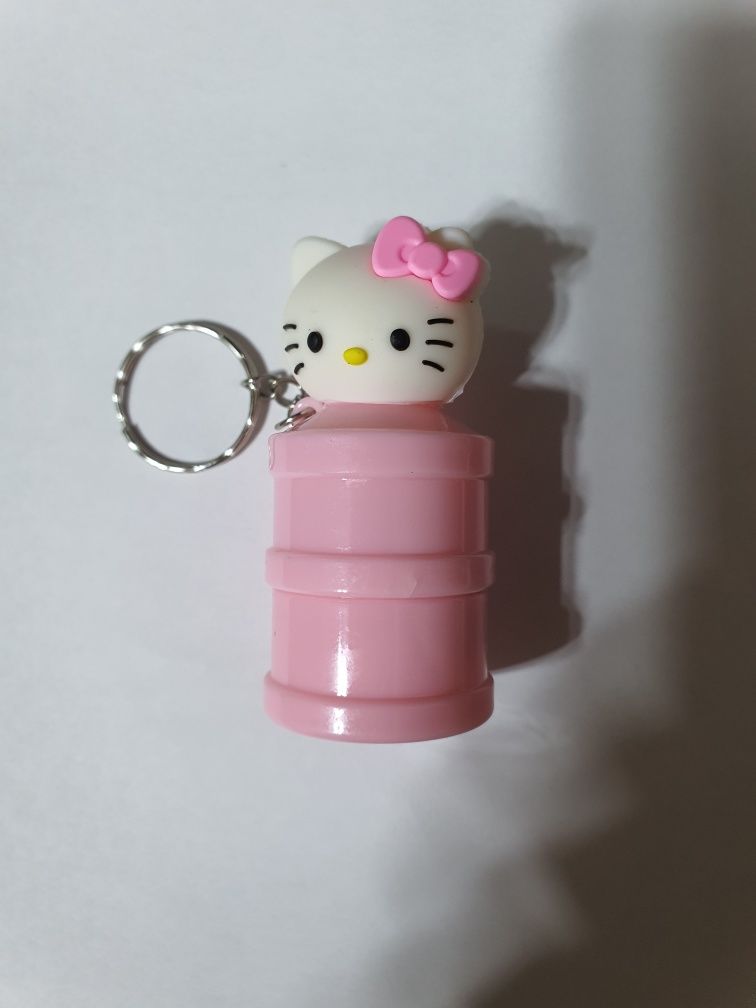 Hello Kitty 2 în 1 - breloc cu strugurel