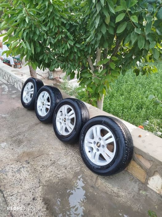 Продам  диски  с резиной.