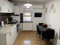 Schimb apartament decomandat 2 camere cu ap 3/4 camere