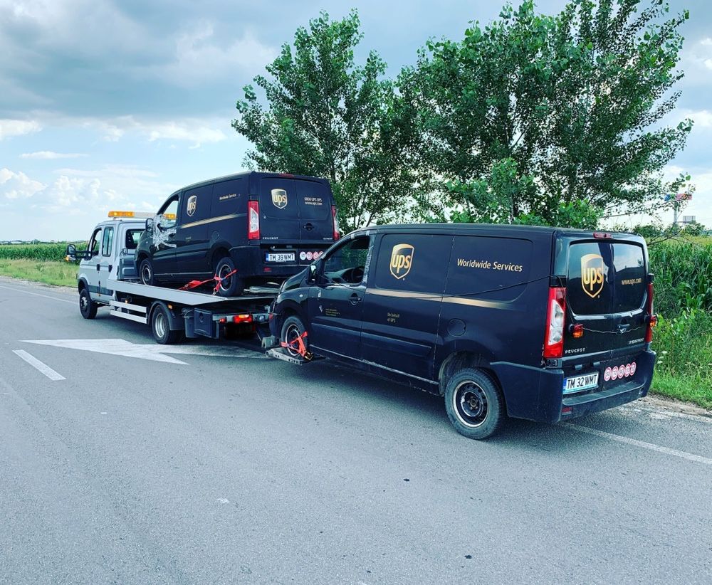 Tractari auto utilaje transport slep platforma auto blocat incuiat