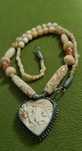 Colier vintage cu pandantiv sculptat