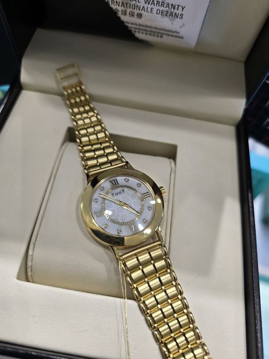 Продам классические часы Tissot в золоте 750 пробы