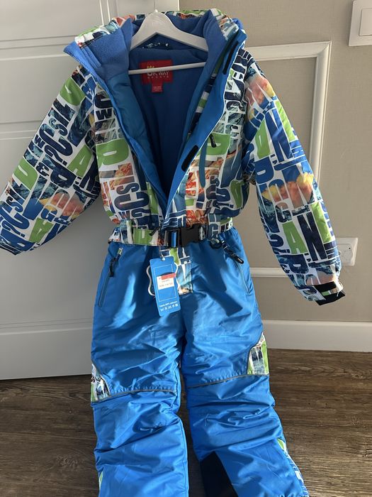 Продам зимнии комбинезон новый