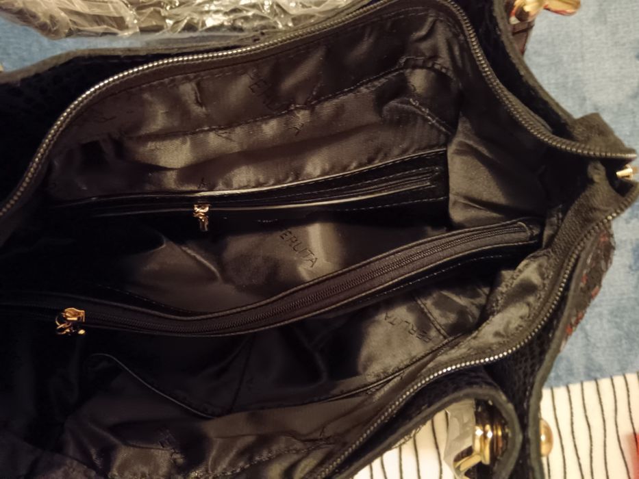 Продам сумку лазер-кожа черную, новую, лёгкую и удобную