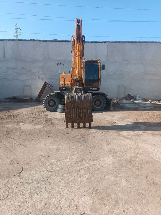 Экскаватор 1400 Ижарага берлади