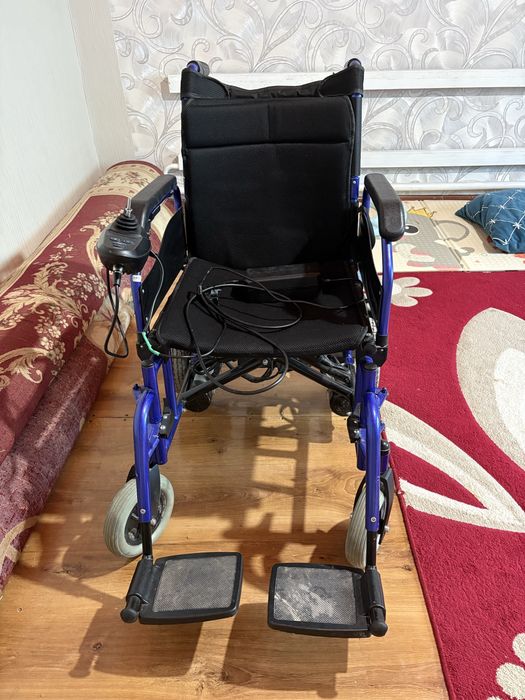 Электрическая инвалидкая коляска