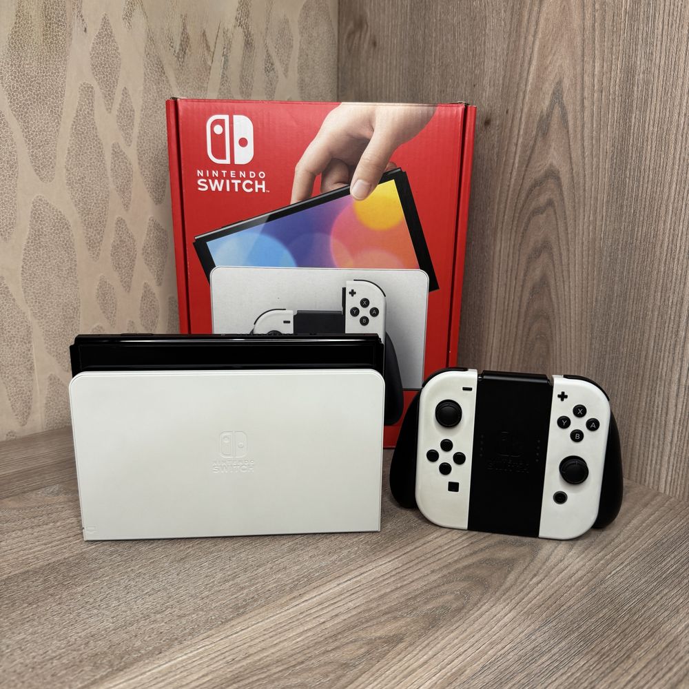 Nintendo switch oled в идеальном состоянии + джостик и кейс